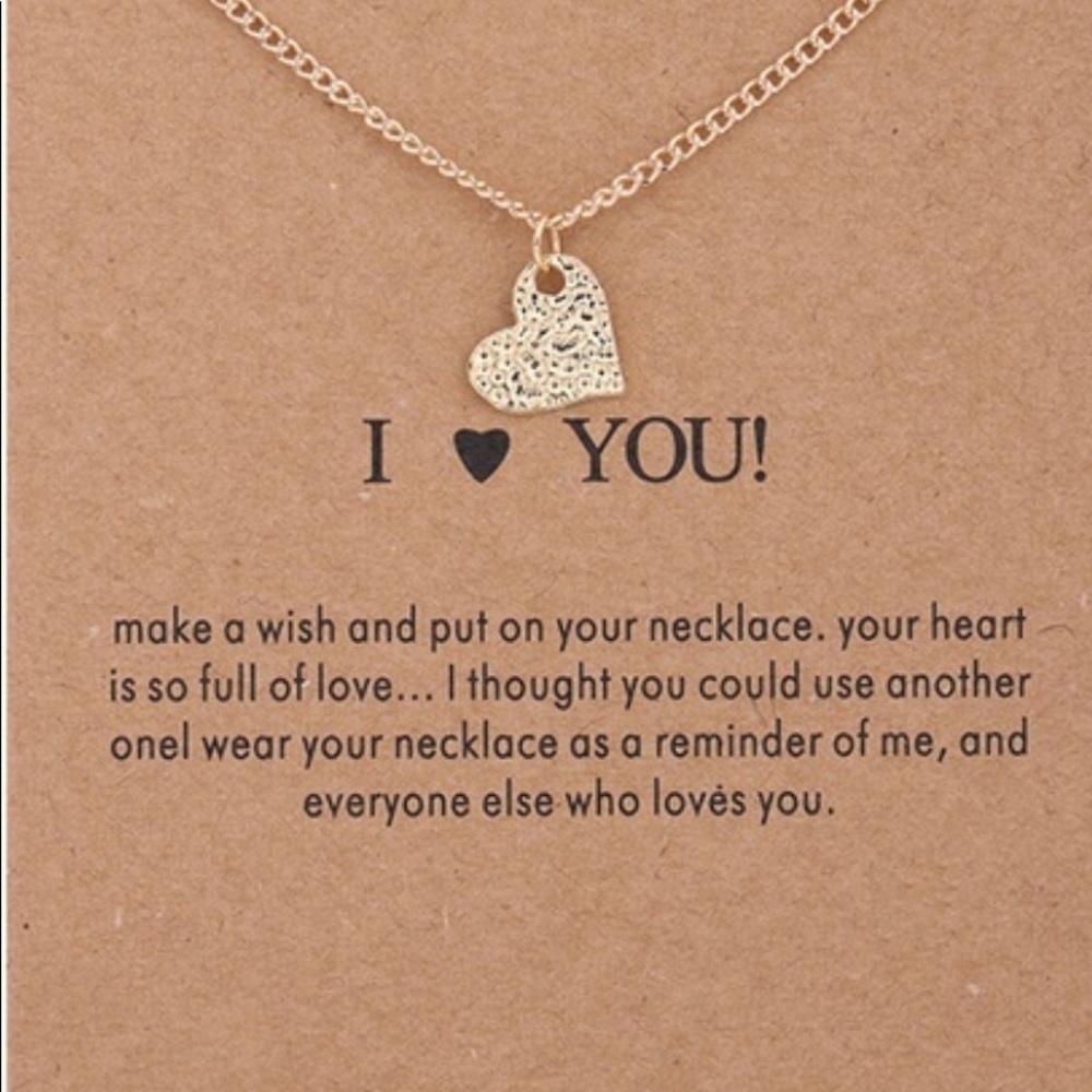Dainty gold heart charm necklace